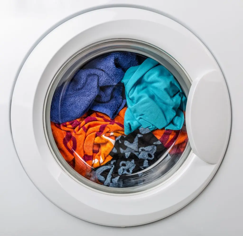 Washing machine with colour clothes inside