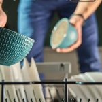What does a half-load setting actually do, and does it save money? The honest answer on water, energy and when a full load wins.
