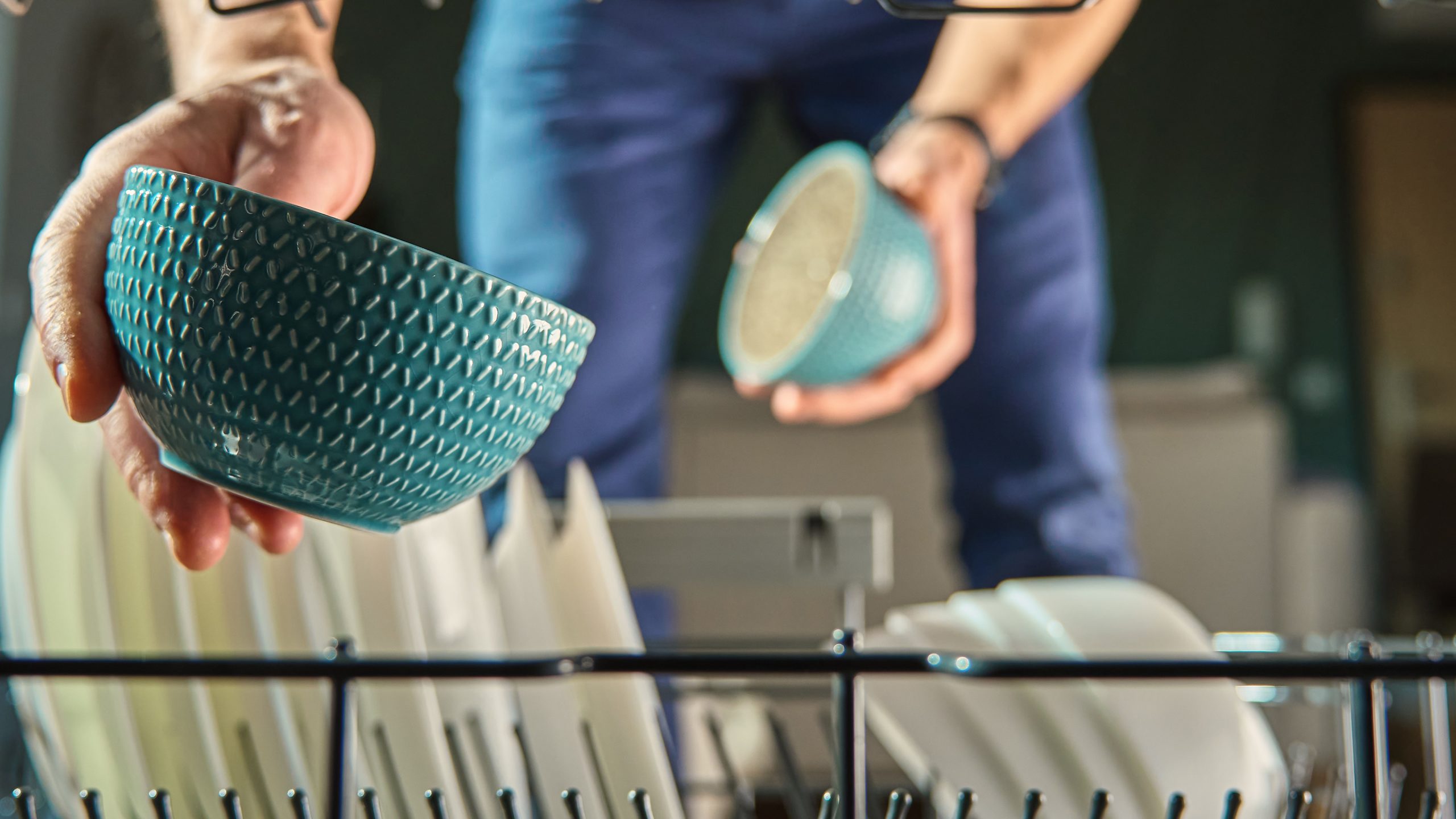 What does a half-load setting actually do, and does it save money? The honest answer on water, energy and when a full load wins.