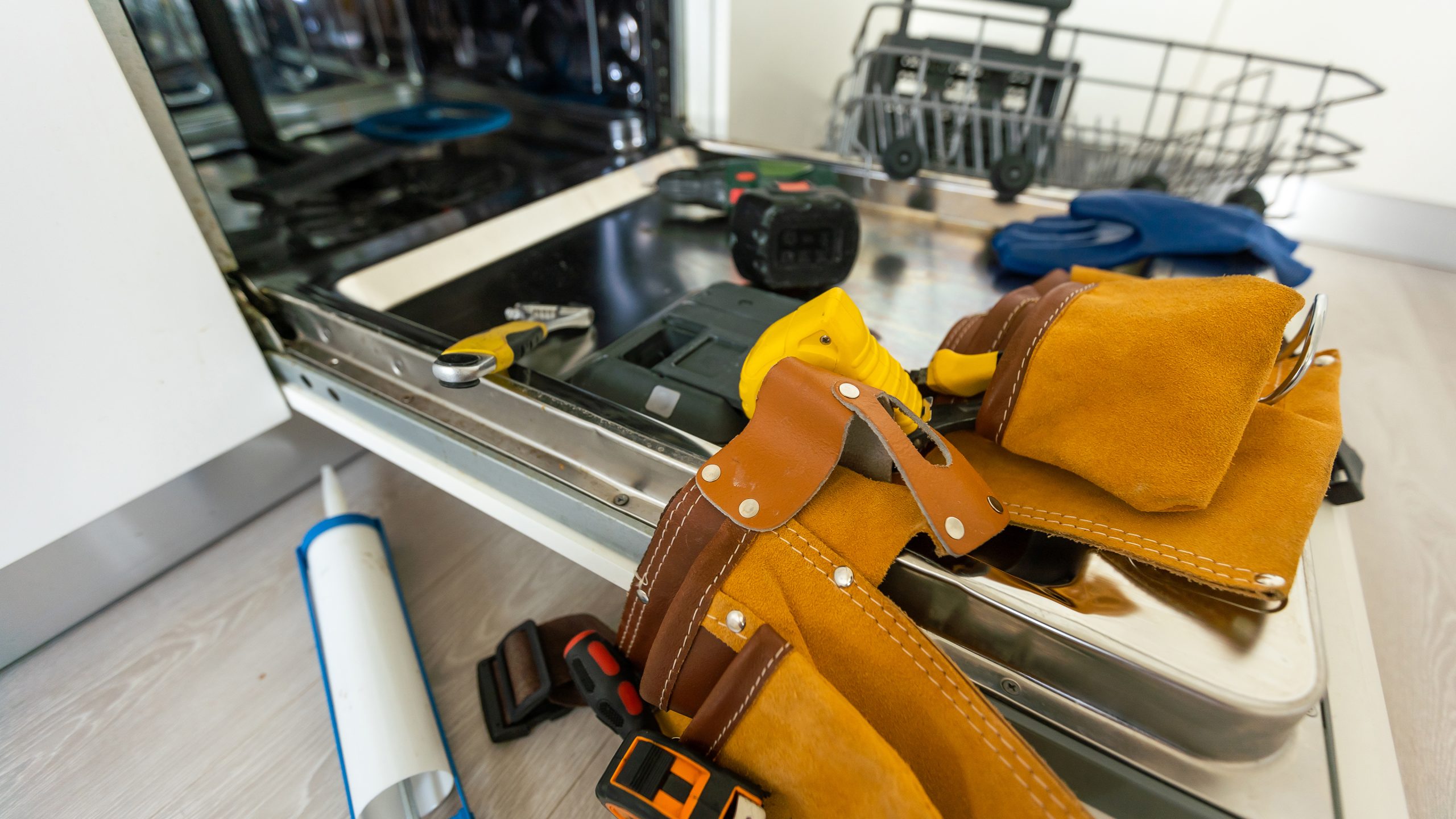 Nine times out of ten a dishwasher that will not drain is a blocked filter, kinked hose, or clogged waste. Here is how to clear it yourself, safely and fast.